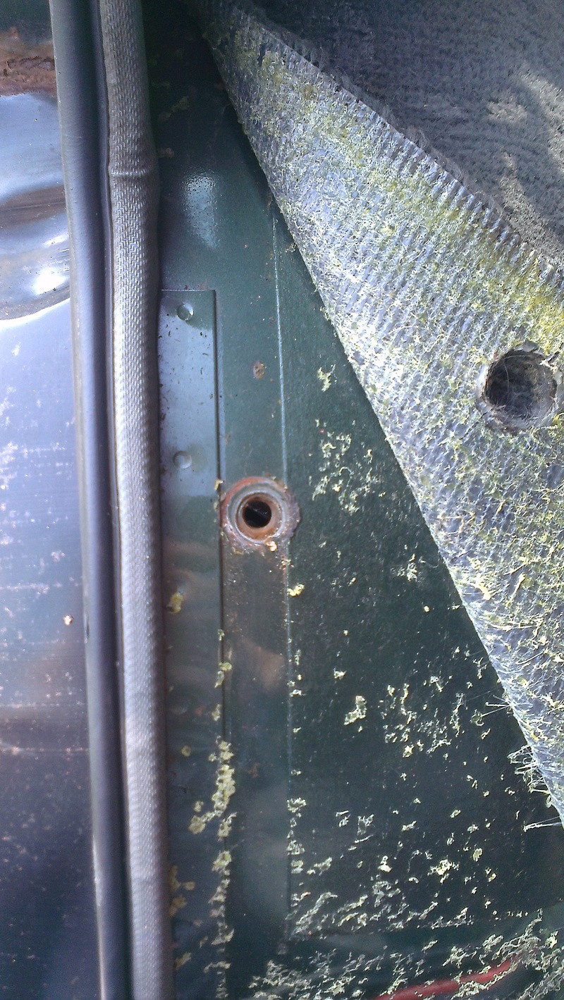 drivers side seat belt mounting.jpg